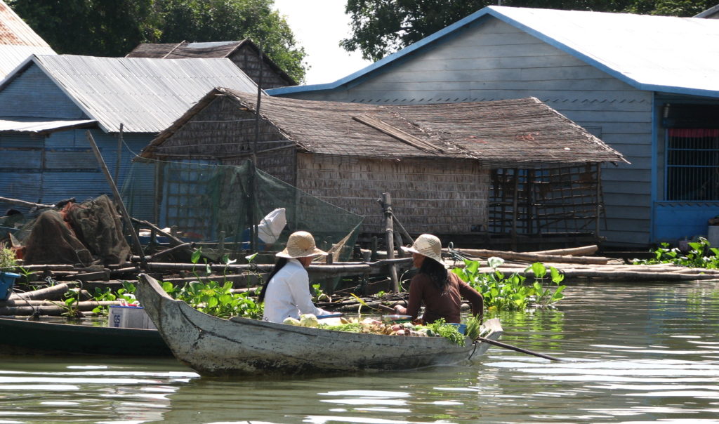 Young women in the floating village of Prek Toal on the Tonle Sap Lake, Cambodia.